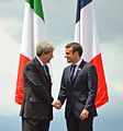 G7 Taormina Paolo Gentiloni Emmanuel Macron handshake 2017-05-26 (cropped).jpg